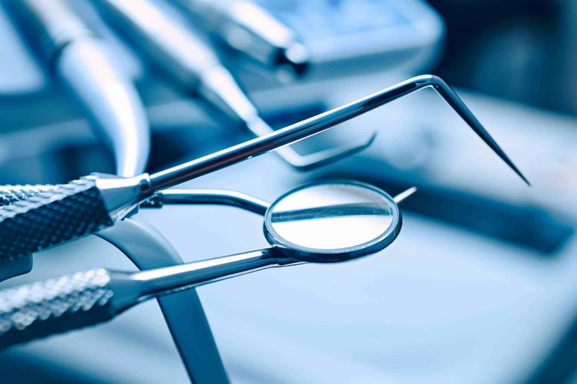 A closeup of dental tools on the table